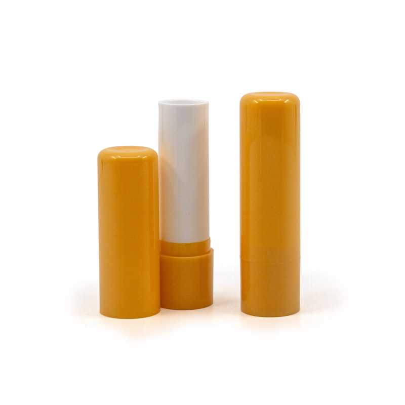 Tube de baume à lèvres Twist Up, bouchon Total Cover, jaune-orange
