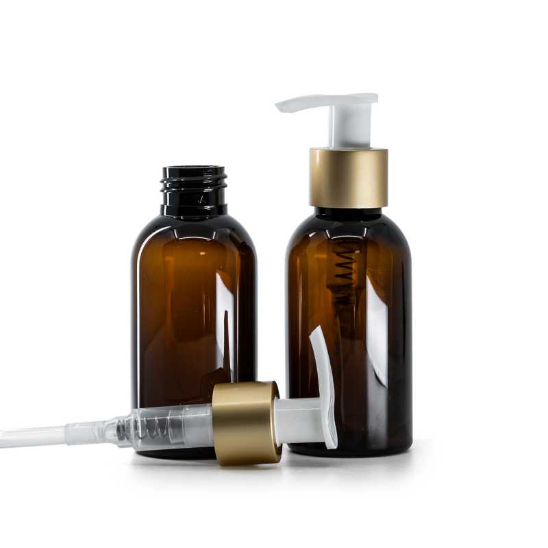 Flacon en plastique ambré, pompe lotion blanche avec bague dorée mate, 100 ml