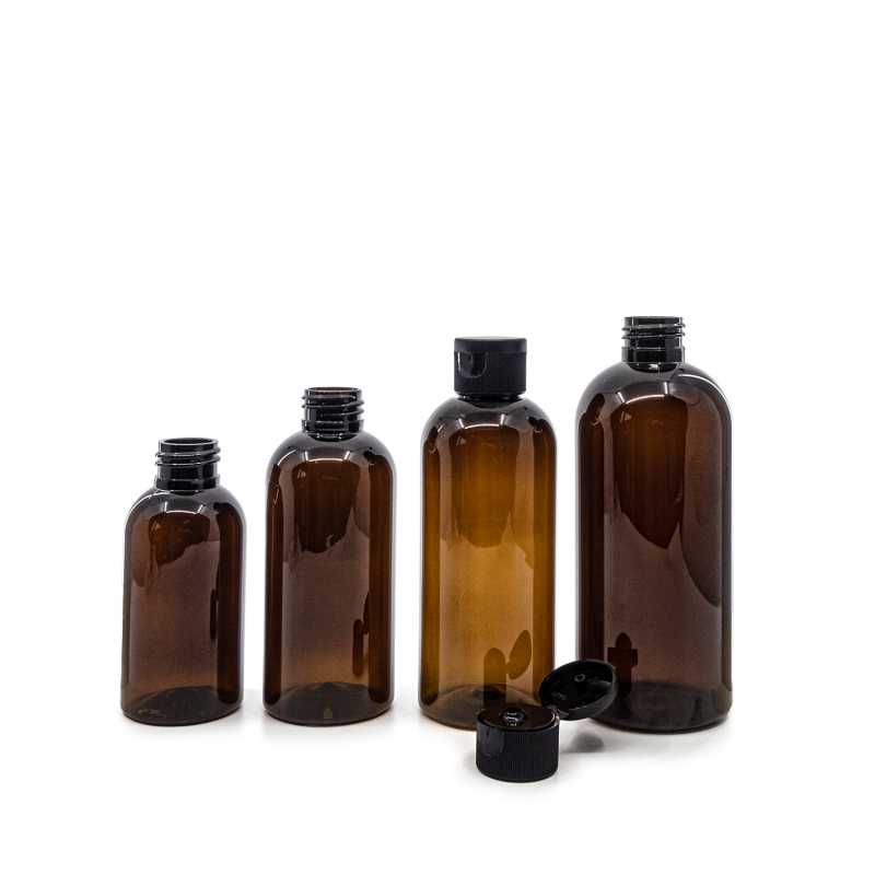 Bouteille en plastique ambrée, bouchon noir, 100 ml