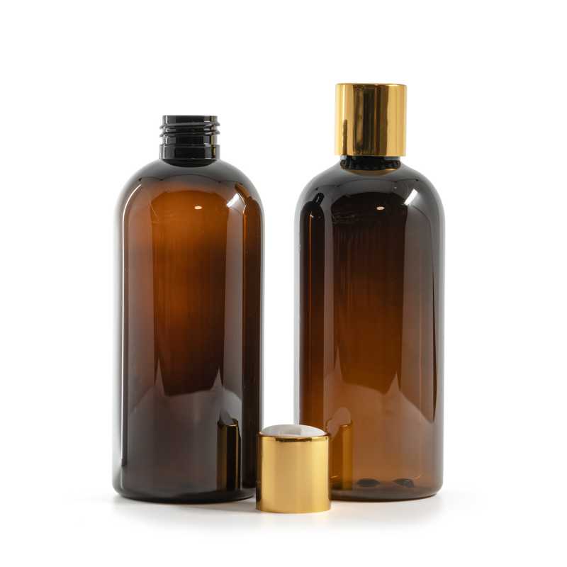 Bouteille en plastique ambrée, bouchon en plastique blanc avec col en aluminium doré, 300 ml