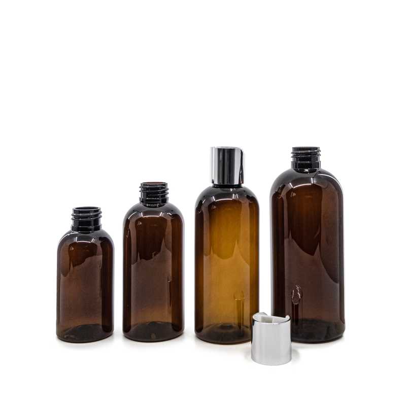 Bouteille en plastique ambrée, couvercle à disque argenté, 100 ml