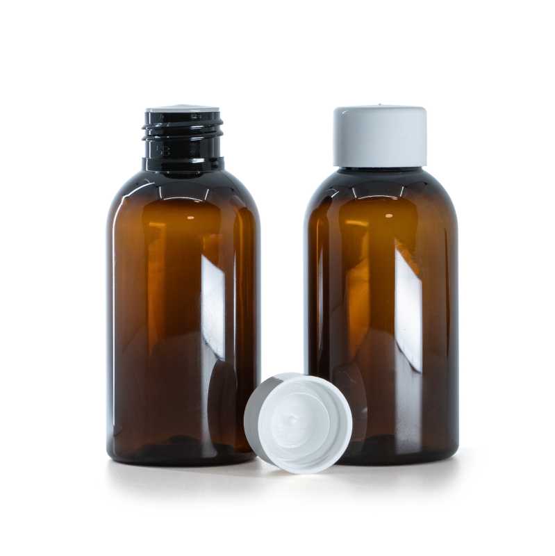Flacon en plastique ambré, bouchon lisse blanc avec réducteur, 100 ml