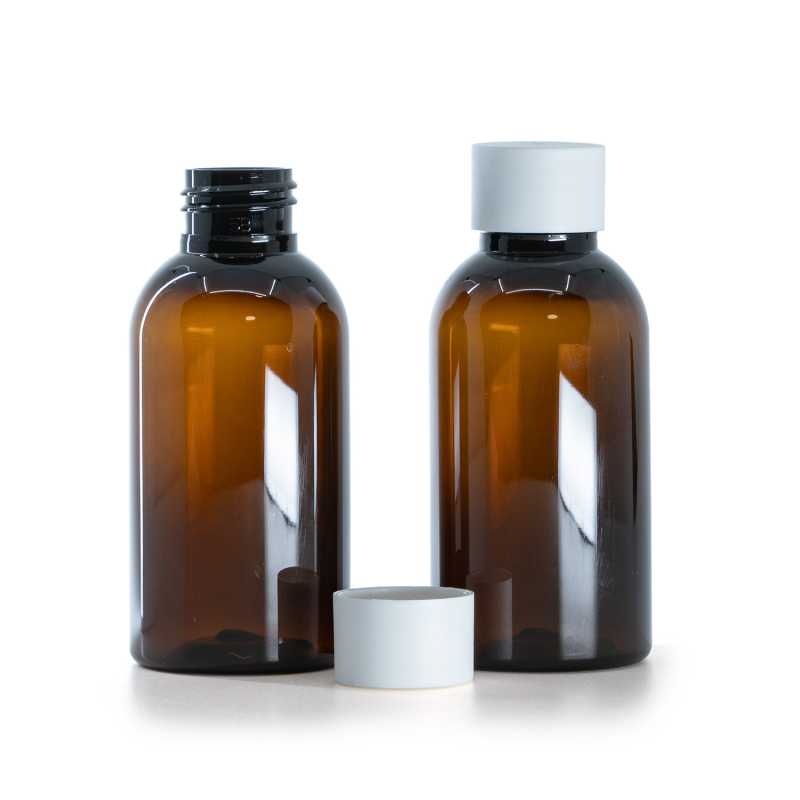 Flacon en plastique ambré, bouchon blanc mat, 100 ml