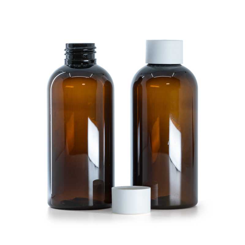 Flacon en plastique brun, bouchon blanc mat, 150 ml