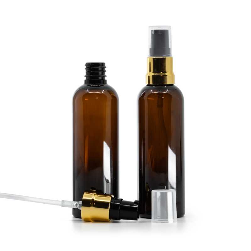 Bouteille en plastique ambrée, pompe noire dorée brillante avec bouchon transparent, 100 ml