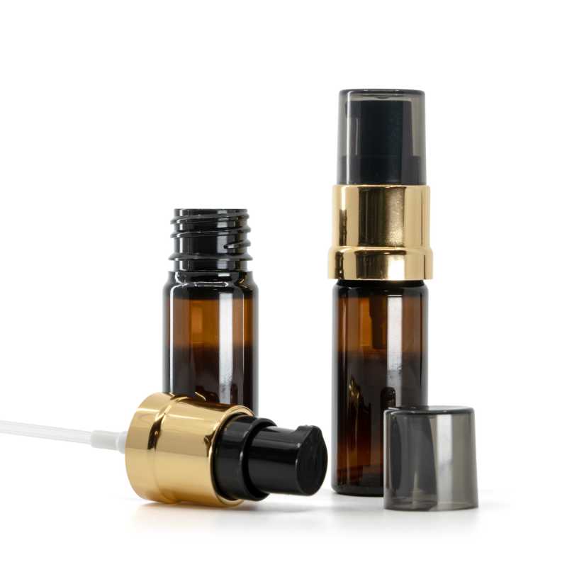 Flacon en plastique brun, pompe noir-or brillante avec surcapuchon fumé, 10 ml