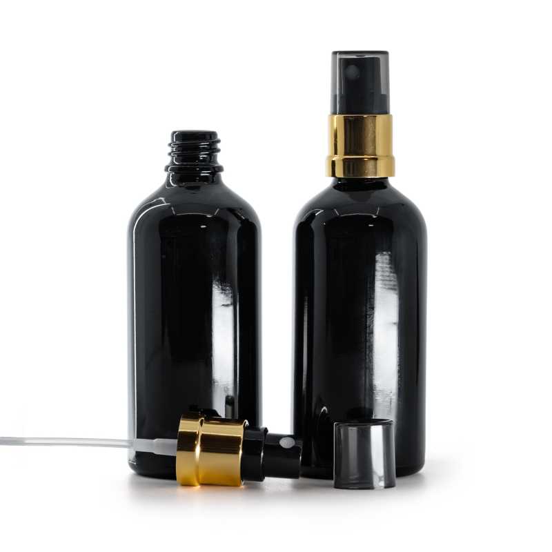 Flacon en verre noir brillant, vaporisateur noir et or, surcapuchon fumé, 100 ml