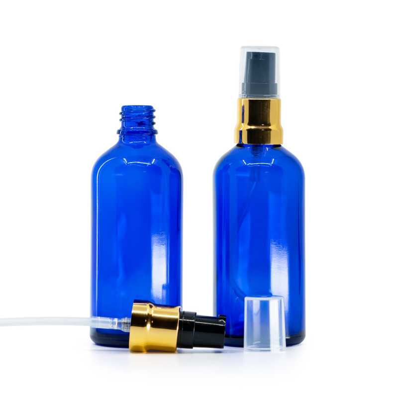 Bouteille en verre bleu, pompe noire dorée brillante avec bouchon transparent, 100 ml