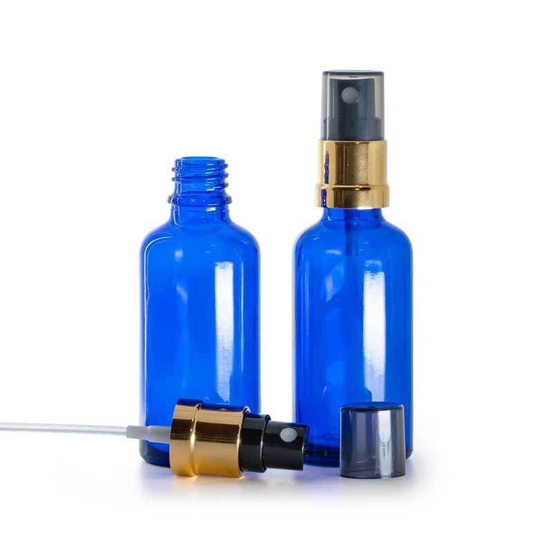 Flacon en verre bleu, pompe spray noir et or brillant, surbouchon fumé, 50 ml