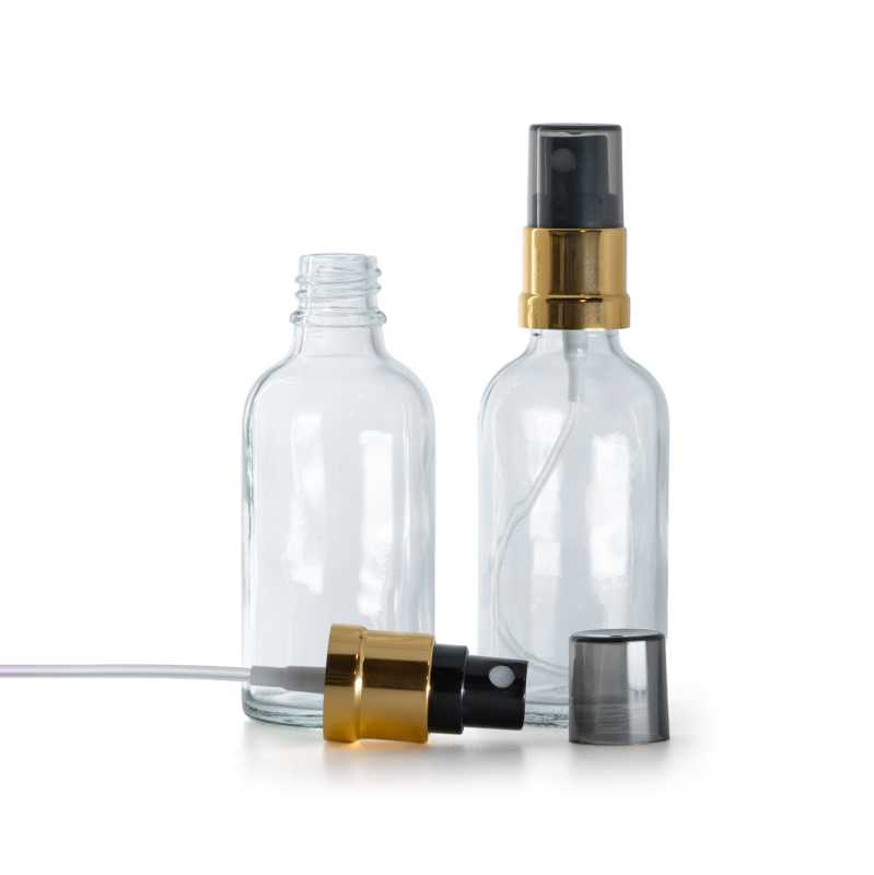 Flacon en verre transparent, pompe spray noire à bague dorée brillante, capot fumé, 30 ml