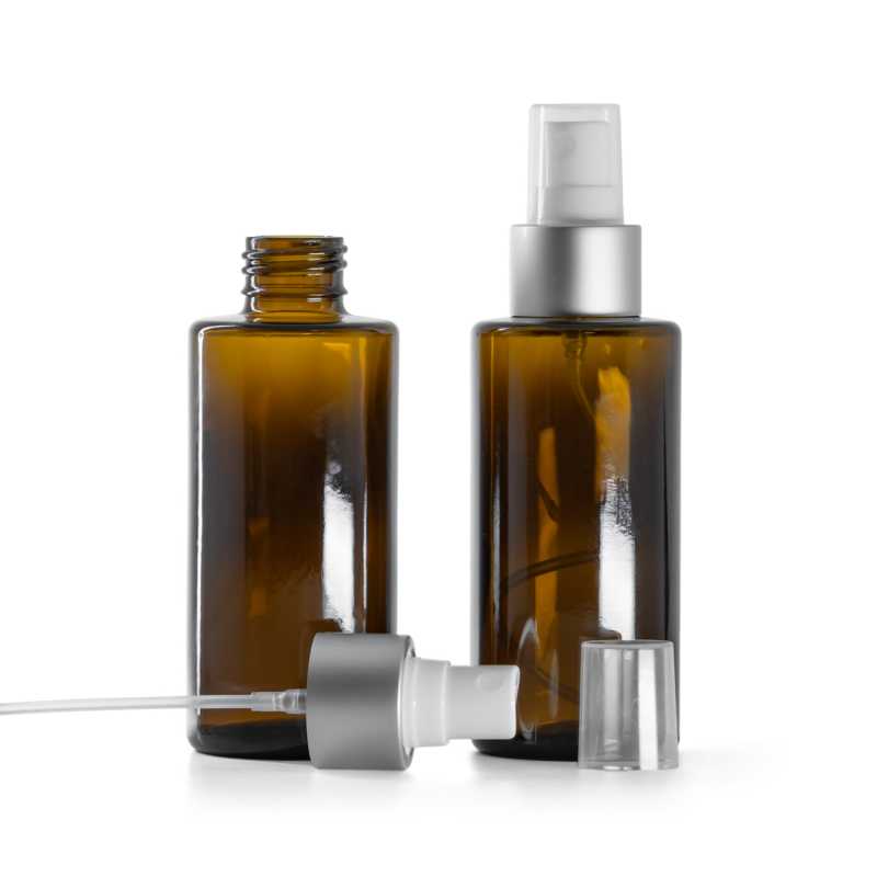 Flacon en verre ambré, col droit, 24 mm, pompe spray blanche avec bague argent mat, 100 ml