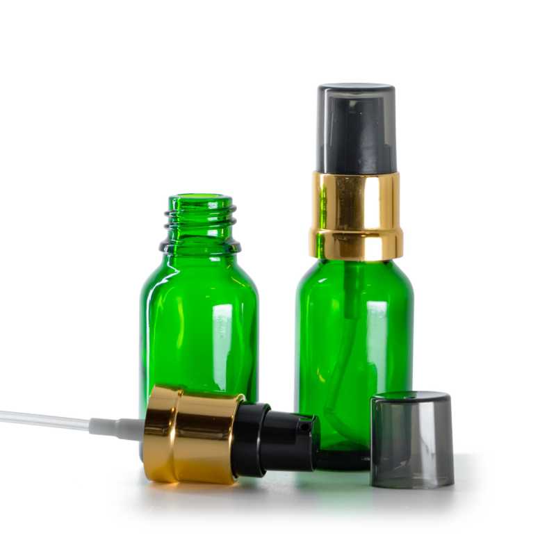 Flacon en verre vert, pompe noir et or brillante avec surcapuchon fumé, 15 ml