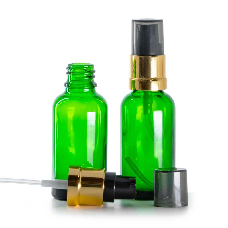 Flacon en verre vert, distributeur noir et doré brillant avec surcapuchon fumé, 30 ml