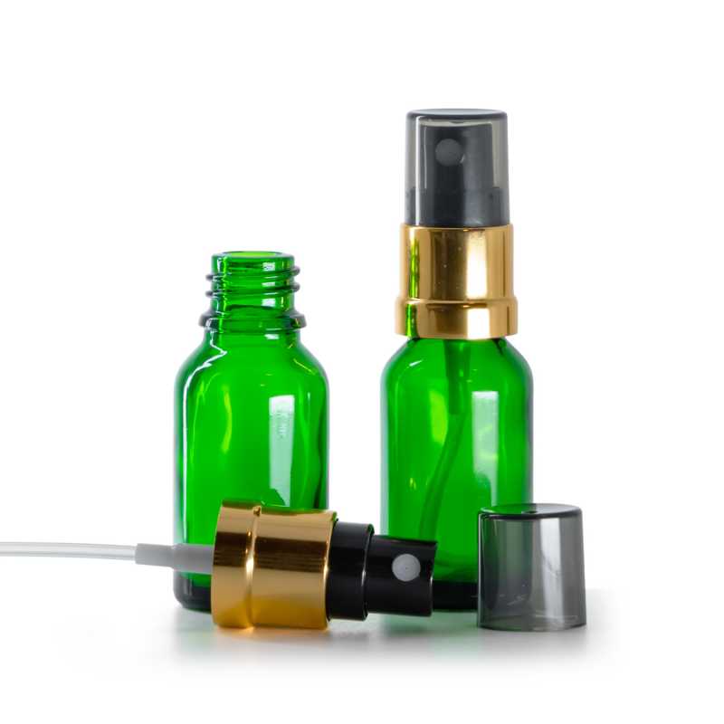 Flacon en verre vert, vaporisateur noir et doré, surcapuchon fumé, 15 ml