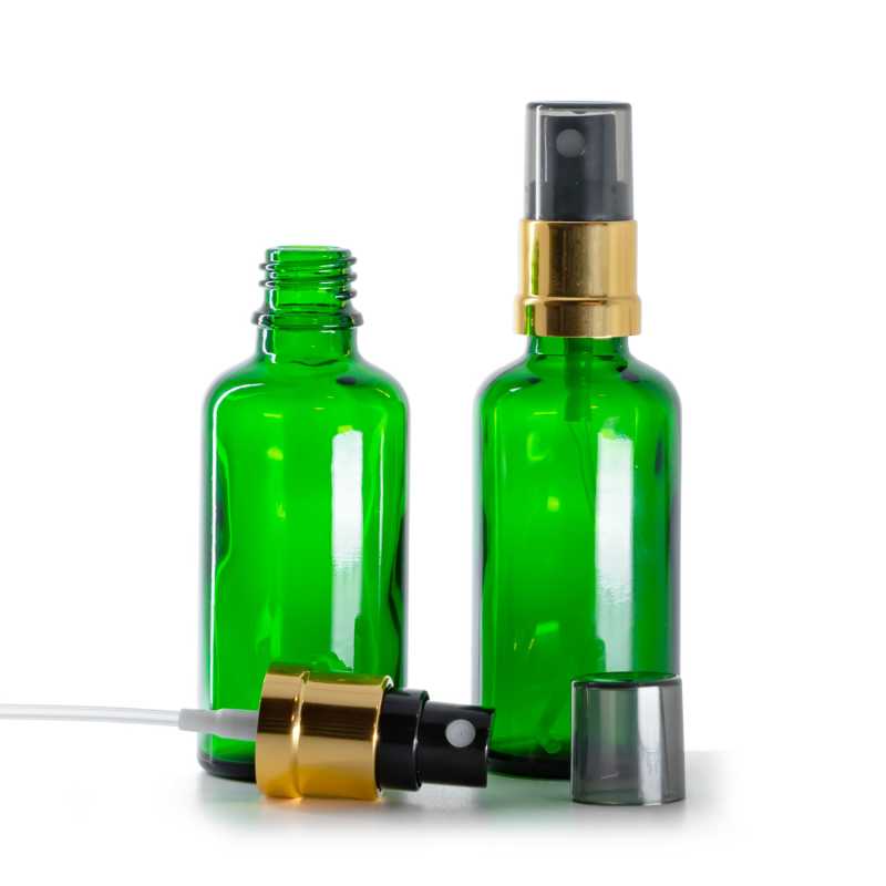 Flacon en verre vert, vaporisateur noir et doré avec surcapuchon fumé, 50 ml