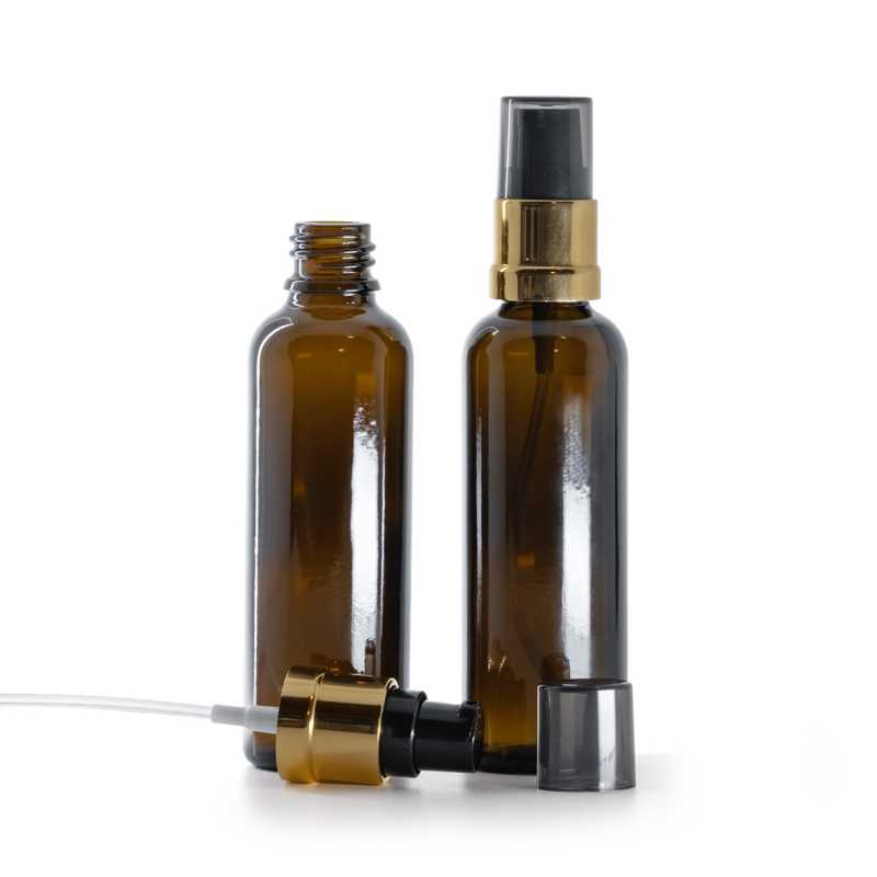 Flacon en verre brun, haut, pompe noire et dorée brillante avec surcapuchon fumé, 50 ml